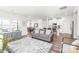 Open-concept living space showcasing the living room, dining area, and modern kitchen at 5367 Turtle Creek Dr, Denver, NC 28037