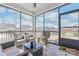 Screened in porch features a ceiling fan and outdoor furniture at 5367 Turtle Creek Dr, Denver, NC 28037