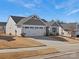 Charming single-Gathering home with a two-car garage and well-manicured lawn at 609 Grandiflora Ave, Lancaster, SC 29720