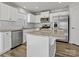 Beautiful kitchen featuring a large center island, stainless steel appliances, and granite countertops at 609 Grandiflora Ave, Lancaster, SC 29720