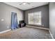 A secondary bedroom features a window and ample space at 6618 Alexander Rd, Charlotte, NC 28270