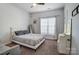 A bright bedroom featuring neutral walls and ample light at 6618 Alexander Rd, Charlotte, NC 28270