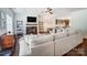 Spacious living room with an open floor plan, a fireplace, and modern décor at 6618 Alexander Rd, Charlotte, NC 28270