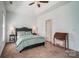 Spacious main bedroom featuring a tray ceiling, neutral color scheme, and two windows for natural light at 6618 Alexander Rd, Charlotte, NC 28270
