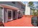 Spacious red back deck is the perfect place for entertaining and outdoor dining at 7533 Lady Bank Dr, Charlotte, NC 28269