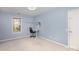 Bedroom with a window and a desk at 7533 Lady Bank Dr, Charlotte, NC 28269