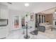 Cozy breakfast nook with view into living room and access to backyard patio at 7533 Lady Bank Dr, Charlotte, NC 28269