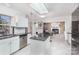 Bright kitchen open to the living room, featuring stainless steel appliances at 7533 Lady Bank Dr, Charlotte, NC 28269