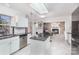 Bright kitchen open to the living room, featuring stainless steel appliances at 7533 Lady Bank Dr, Charlotte, NC 28269