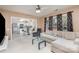 Bright living room flows into kitchen with stainless steel appliances and island at 7533 Lady Bank Dr, Charlotte, NC 28269