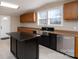 Kitchen featuring an island, stainless steel appliances, and sink at 7536 Beaver Rd, Kannapolis, NC 28081