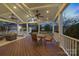 Cozy covered back porch is ideal for outdoor dining and evening relaxation at 7704 Sharpthorne Pl, Charlotte, NC 28270