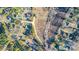 An aerial view shows the layout of the neighborhood and the surrounding trees and houses at 805 Tirzah Rd, York, SC 29745