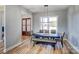 Dining room featuring modern lighting fixture and hardwood floors at 805 Tirzah Rd, York, SC 29745