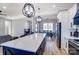 Stunning kitchen featuring an expansive island with quartz countertops and modern stainless steel appliances at 805 Tirzah Rd, York, SC 29745