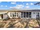A view of the backyard with patio and screened porch at 9005 Smokey Hill Ln, Indian Land, SC 29707