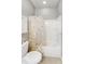Bathroom featuring a toilet, tub/shower with a patterned curtain, cabinet storage, and recessed lighting at 9005 Smokey Hill Ln, Indian Land, SC 29707
