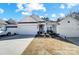 Lovely single-story home with a two-car garage, inviting front porch, and tidy landscaping at 9005 Smokey Hill Ln, Indian Land, SC 29707