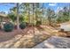 Well maintained yard with mature trees and attractive landscaping at 9005 Smokey Hill Ln, Indian Land, SC 29707