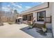 Backyard with patio, stairs, and an umbrella table set, perfect for entertaining at 9260 Ahavah Ln, Indian Trail, NC 28079