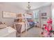 bedroom with bunk beds, chandelier lighting, and a window at 9260 Ahavah Ln, Indian Trail, NC 28079