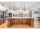 Spacious kitchen with a large center island, stainless steel appliances, and ample storage for modern convenience at 9260 Ahavah Ln, Indian Trail, NC 28079