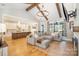 Bright living room features open floor plan and large windows that provide an abundance of natural light at 9260 Ahavah Ln, Indian Trail, NC 28079