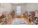 Play room with hardwood floors, a window, and toys and furniture at 9260 Ahavah Ln, Indian Trail, NC 28079