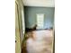 Bedroom with hardwood floors, two windows and a closet at 981 15Th St # 16, Lancaster, SC 29720