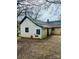 Exterior rear view of a home needing renovations, with siding and backyard visible at 981 15Th St # 16, Lancaster, SC 29720