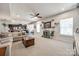 Inviting living space with plush seating, an open layout, and a view to the modern kitchen at 10379 Black Locust Ln, Charlotte, NC 28215