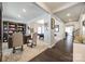 Spacious living room featuring an open layout, hardwood floors, and sophisticated decor at 10379 Black Locust Ln, Charlotte, NC 28215