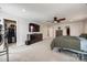 Large main bedroom with a walk-in closet, ceiling fan, and plenty of natural light at 10379 Black Locust Ln, Charlotte, NC 28215