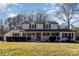 Charming two-story home with a welcoming front porch and well-maintained landscaping at 1201 Edgefield Ave, Gastonia, NC 28052