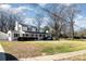 Charming two-story home with a welcoming front porch and well-maintained landscaping on a sprawling lawn at 1201 Edgefield Ave, Gastonia, NC 28052
