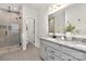 Bathroom featuring a walk-in shower, granite countertops, and modern fixtures for a luxurious feel at 134 Montgomery Pl # 708, Mount Gilead, NC 27306