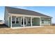 A green modern home exterior featuring a covered back patio at 134 Montgomery Pl # 708, Mount Gilead, NC 27306