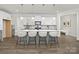 Stylish kitchen with a large island, modern pendant lighting, and an open layout at 134 Montgomery Pl # 708, Mount Gilead, NC 27306