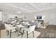 Bright, open living space with a modern kitchen, dining area, and comfortable seating at 134 Montgomery Pl # 708, Mount Gilead, NC 27306