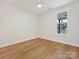 This bedroom features a ceiling fan and large window at 1467 Centennial Dr, Rock Hill, SC 29732