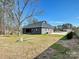 Back exterior view of the home and vast yard at 1467 Centennial Dr, Rock Hill, SC 29732