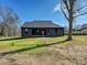 View of the home's backyard and exterior with a beautiful lawn at 1467 Centennial Dr, Rock Hill, SC 29732