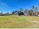 Well maintained front yard featuring a covered porch at 1467 Centennial Dr, Rock Hill, SC 29732
