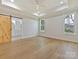 This large main bedroom has plenty of open floor space, decorative tray ceiling, and two windows at 1467 Centennial Dr, Rock Hill, SC 29732