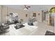 Cozy living room with modern decor, plush seating, and an open layout at 15662 King Louis Ct, Charlotte, NC 28277