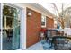Cozy back deck with brick home elevation offers the perfect spot for outdoor relaxation and entertaining at 1597 Mcgill St, Rock Hill, SC 29732