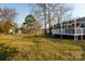 A huge backyard with a large deck, privacy fence, and plenty of green space that's perfect for and pets at 1597 Mcgill St, Rock Hill, SC 29732