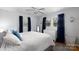 Bright bedroom with a dresser, large windows, hardwood flooring, and lots of natural light at 1597 Mcgill St, Rock Hill, SC 29732