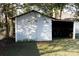 Outdoor shed for convenient storage and a covered area to keep yard equipment out of the weather at 1597 Mcgill St, Rock Hill, SC 29732