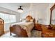 Charming bedroom with hardwood floors, natural light, and traditional-style furnishings at 16137 Tana Tea Cir, Tega Cay, SC 29708